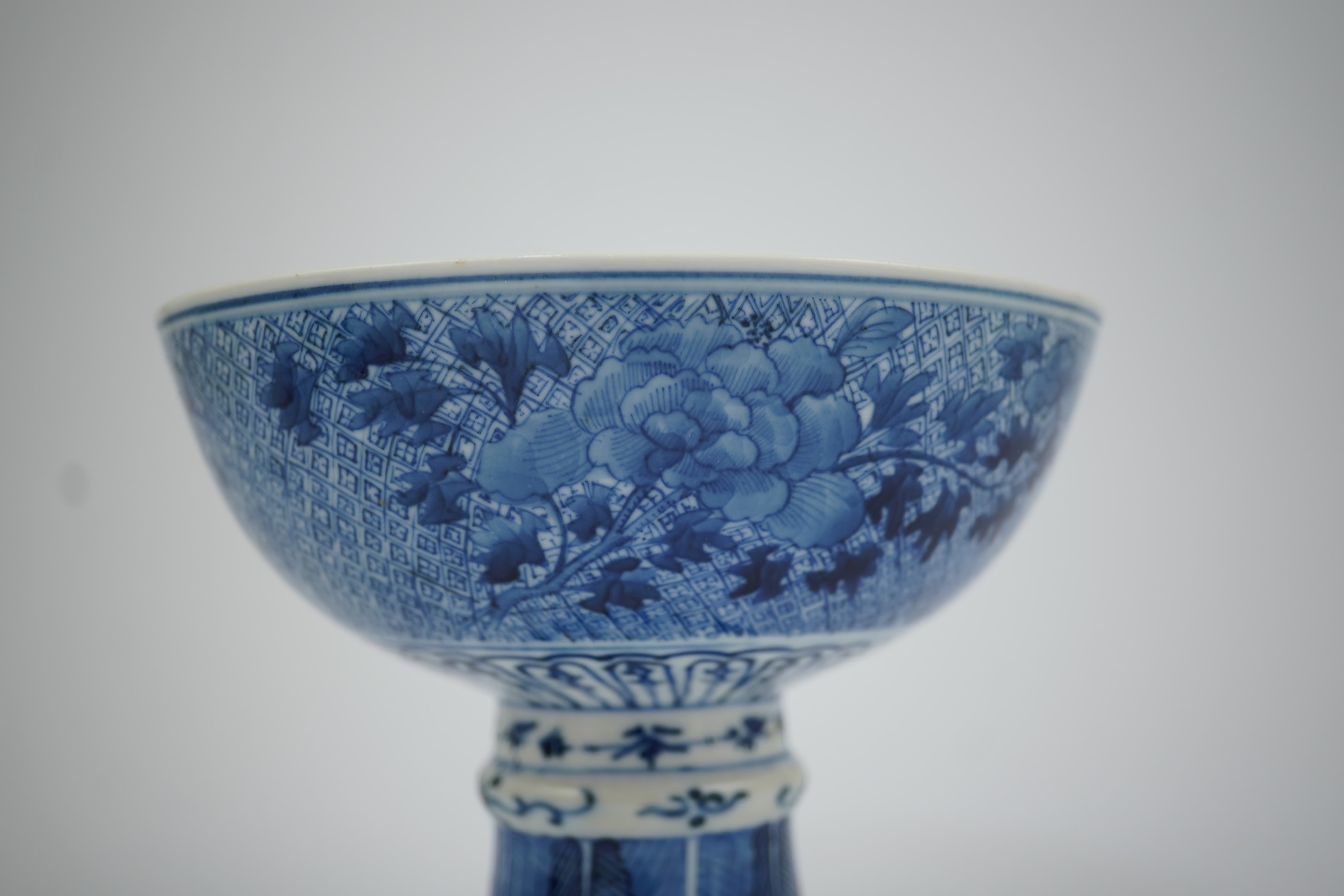 A Chinese blue and white ‘dragon’ stem bowl, Guangxu six character mark and of the period (1875-1908)